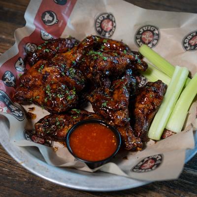 Chicken wings with dip.