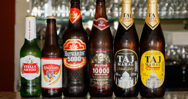 Variety of botteled beers served on the counter