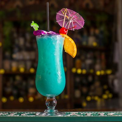 Blue Hawaiian on a bar counter.