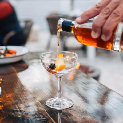Bartender pouring a drink.