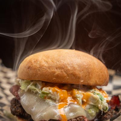 Cheeseburger with pastrami, Russian dressing, and slaw.