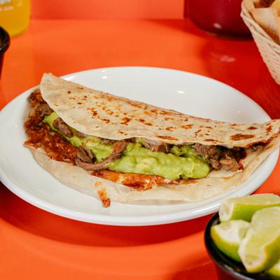 Gringa sirloin quesadilla with guacamole filling.