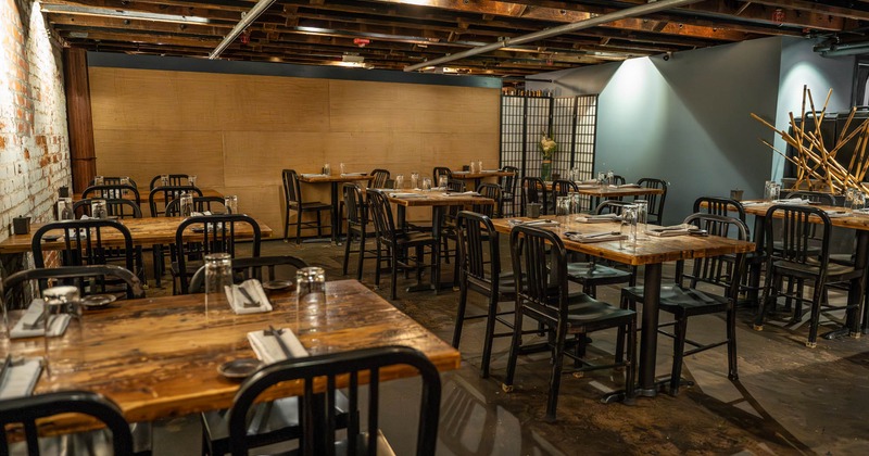 Inside, seating area with tables and chairs