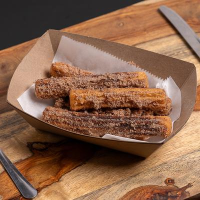 Churros topped with cinnamon and sugar.