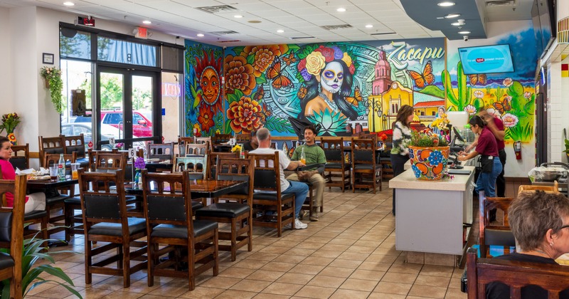 Interior, dining area with Mexican themed mural