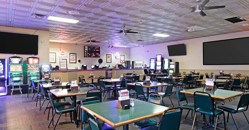 Interior, seating area, slot machines and a counter