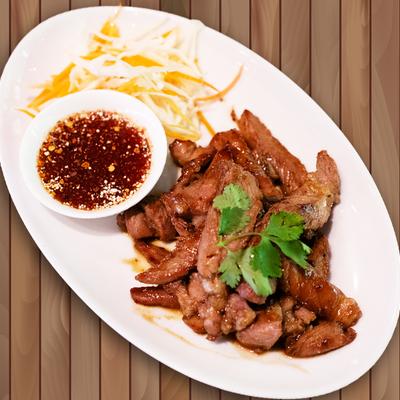 Marinated pork with house special sauce.