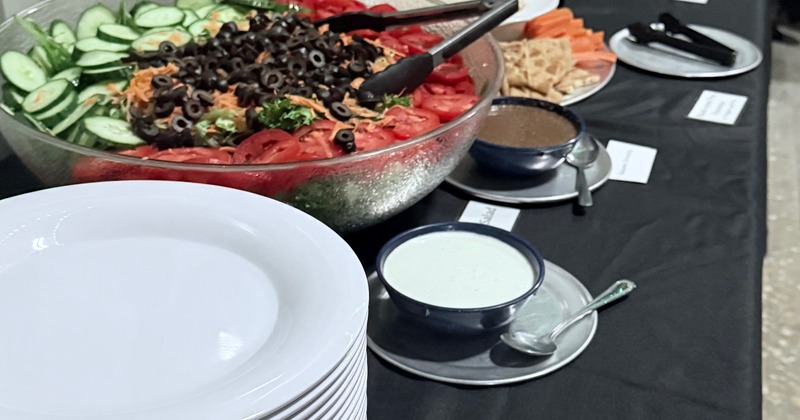 Salad with various dressings served at the table