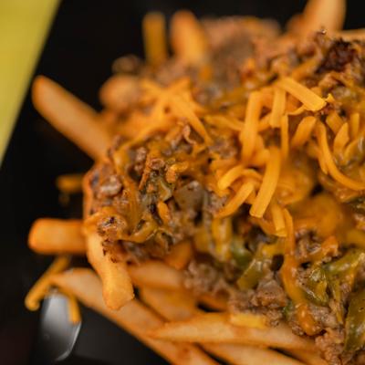 Loaded Cheesesteak Fries, close-up.