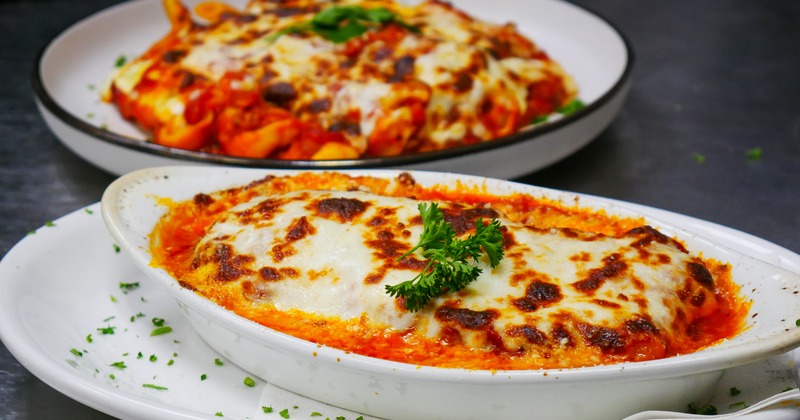 Lasagna and a pasta dish plate