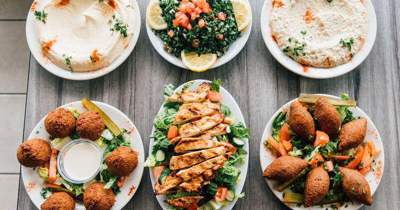 Assorted dish plates arranged on a table, overhead view