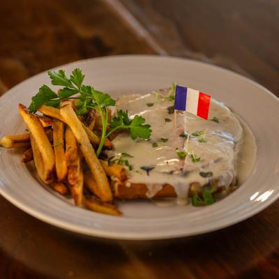 Croque Monsieur sandwich with fries on the side.