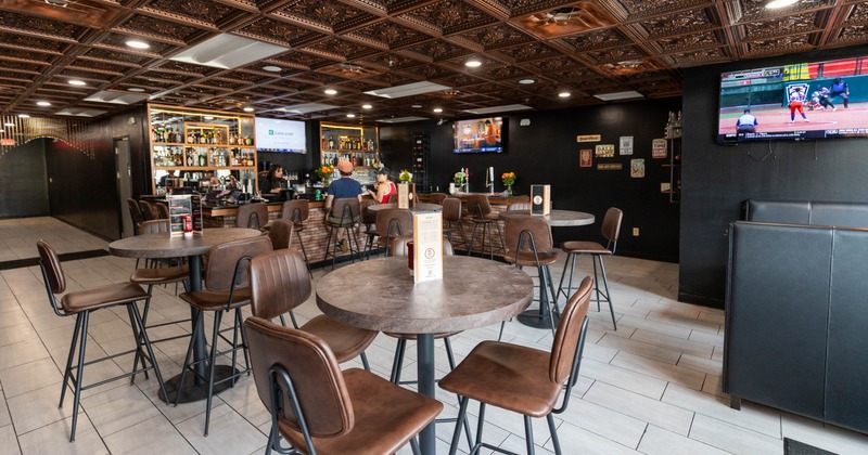 Interior, seating area with tables and chairs