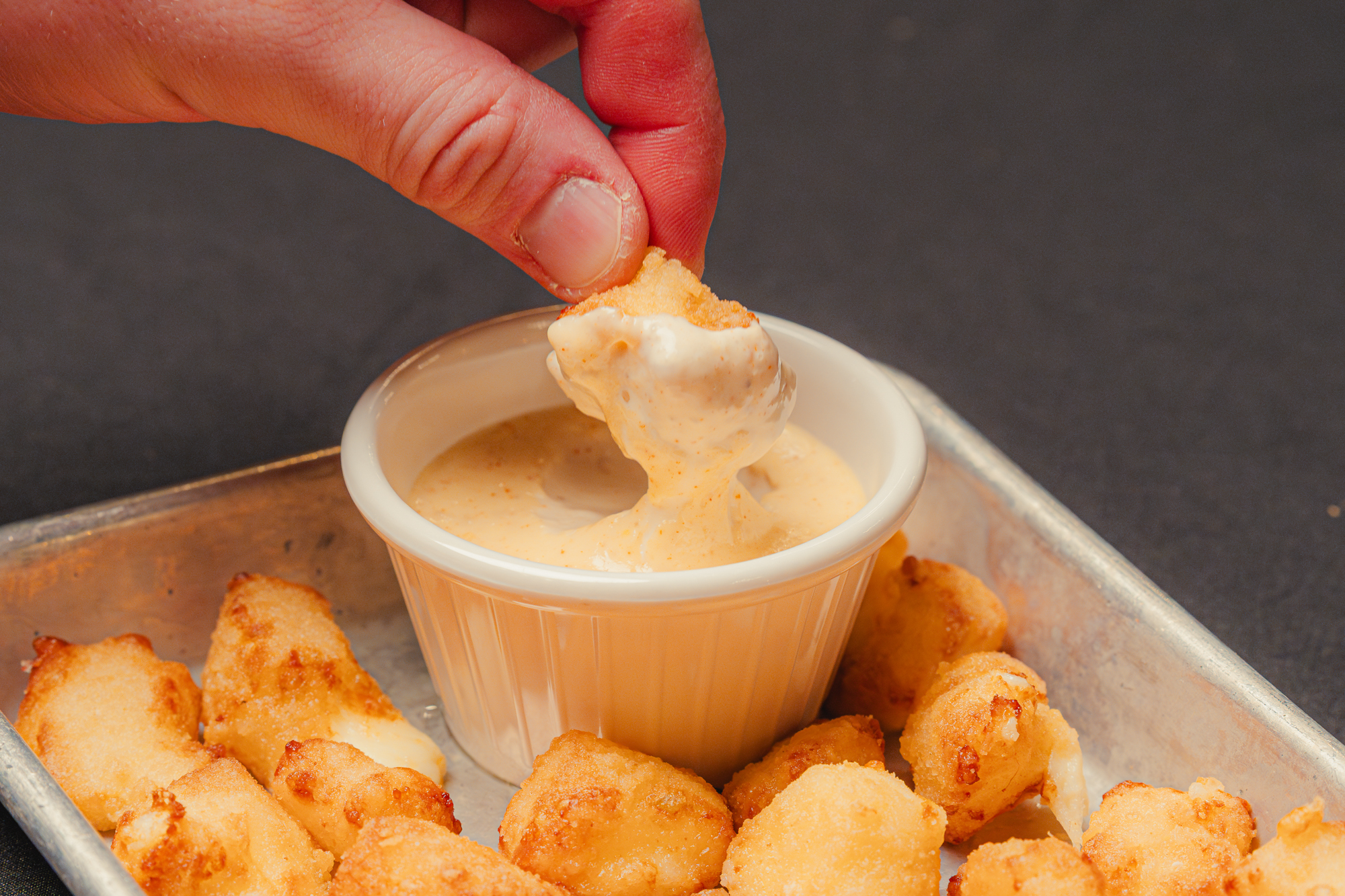 Wisconsin cheese curds with Alabama white BBQ sauce