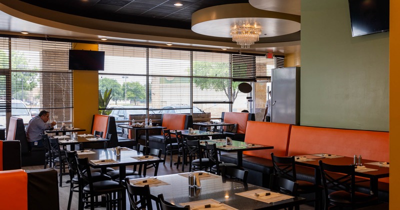 Interior, dining area set for guests