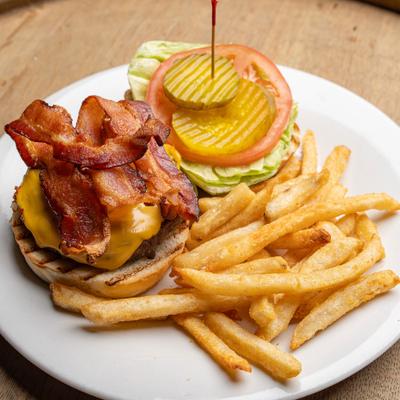 Bacon cheeseburger served with fries and fresh toppings.