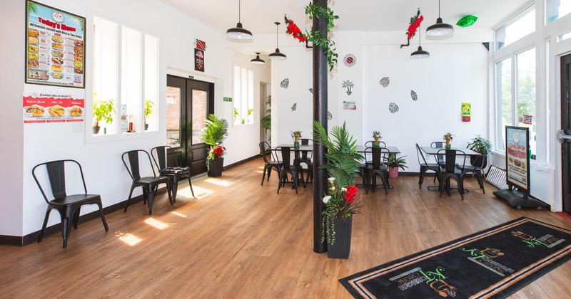 Interior view of a restaurant with wooden flooring