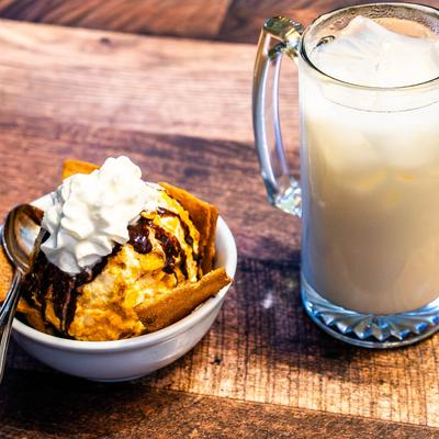Fried ice cream  served with a glass of horchata.