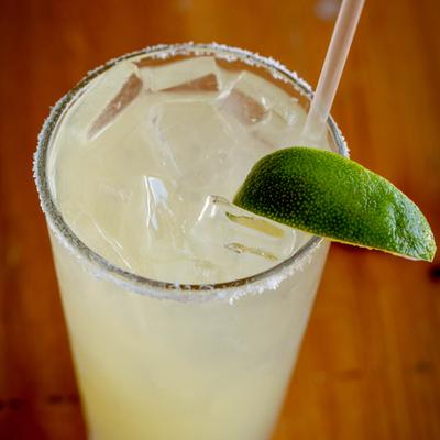 Margarita garnished with a lime wedge.