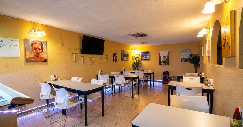Interior of a dining area with tables and chairs