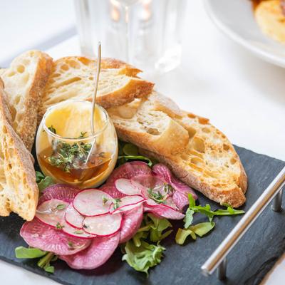 Radish slices, with creamy butter, and crostini