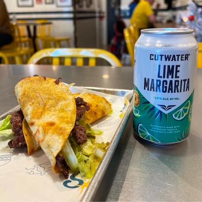 Beef tacos and a can of Lime Margarita.