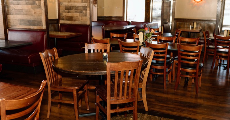 Interior, dining tables ready for guests