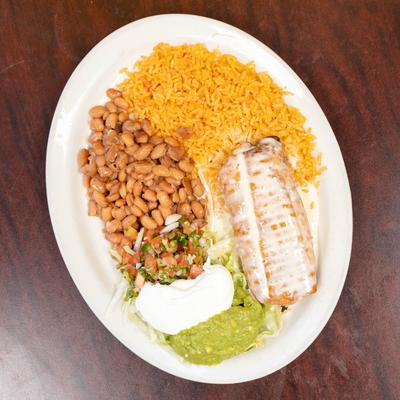 Various food in white table.