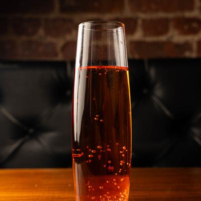 Glass of Champagne served on the table.