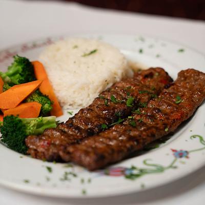 Ground lamb kebab, with rice and veggies.