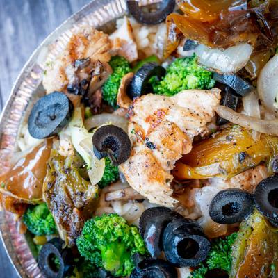 Grilled chicken rice bowl with veggies.