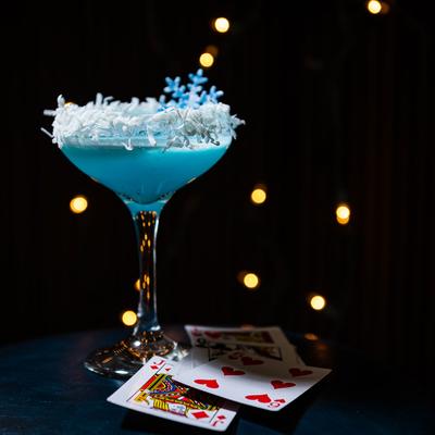 Jack Frost cocktail, several playing cards