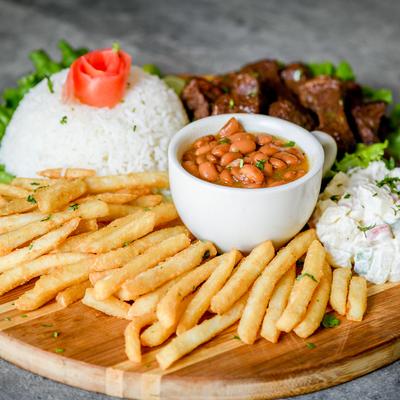 Top sirloin with white rice, fries,  beans and potato salad