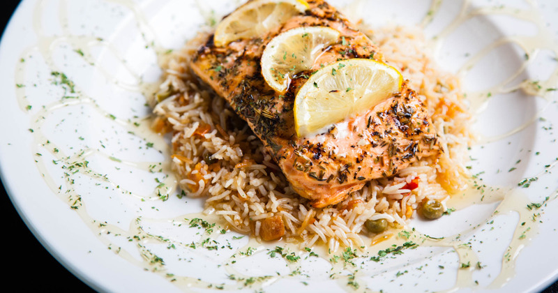 Grilled salmon with rice pilaf