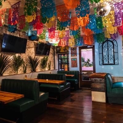 Interior, dining area with colorful decorations.