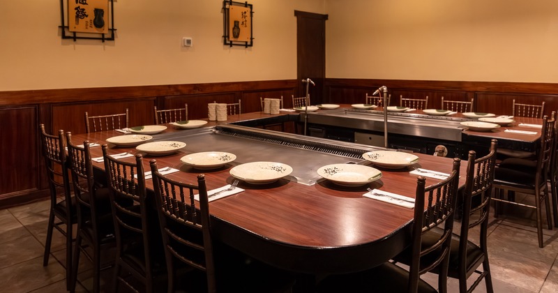 Private dining room in a Japanese-style with two large teppanyaki grills built into the tables