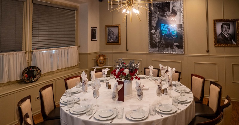Interior, a set table with white tablecloth and tableware