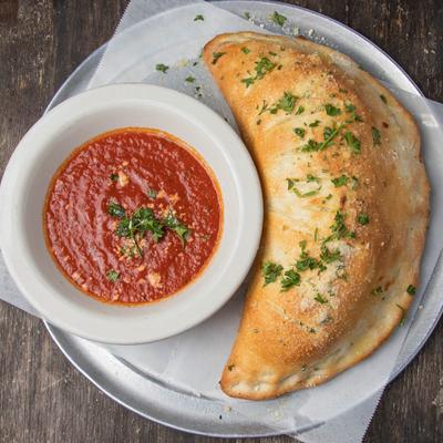 Cheese Calzone with tomato sauce