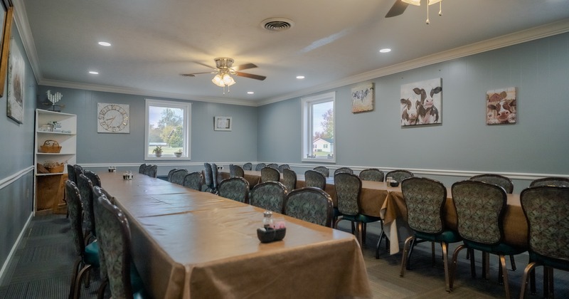 Interior, banquet room , tables and seats, wall decor