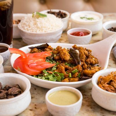 Various served meals and dips.