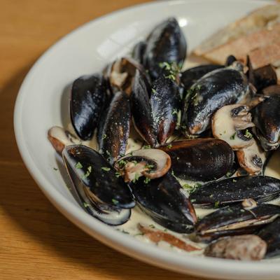 Mussels on plate, close view.
