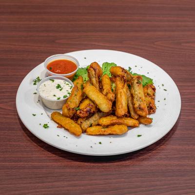 Fried zucchini, with dipping sauces.