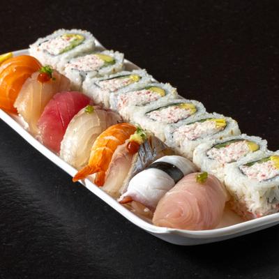 Sushi platter with rolls and assorted nigiri.