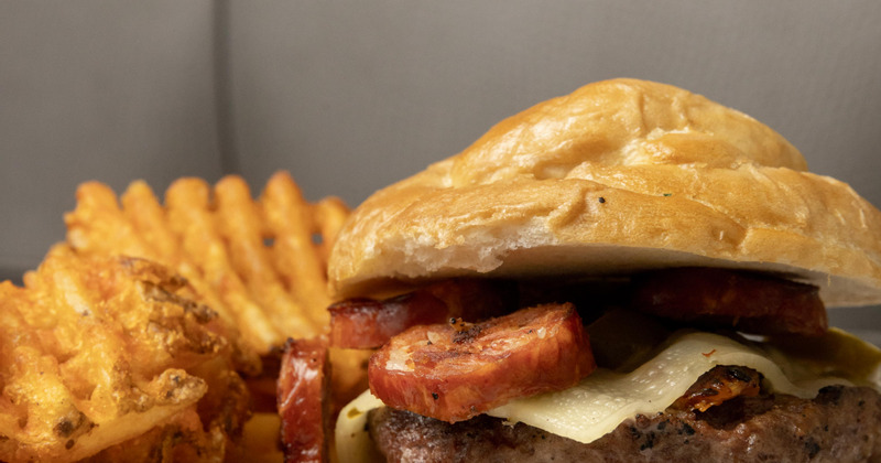 Spanish fly burger with a side of waffle