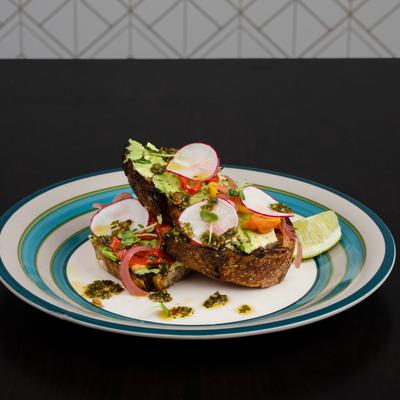 Avocado Toast. levain, radish, olive oil, pine nuts, lemon, Malden, herb salad.