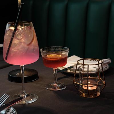 Cocktails served on a dining table.