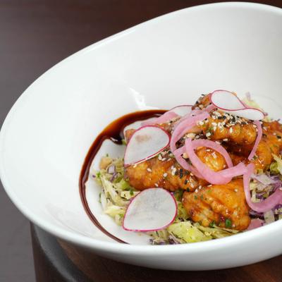 Bowl of salad, served.