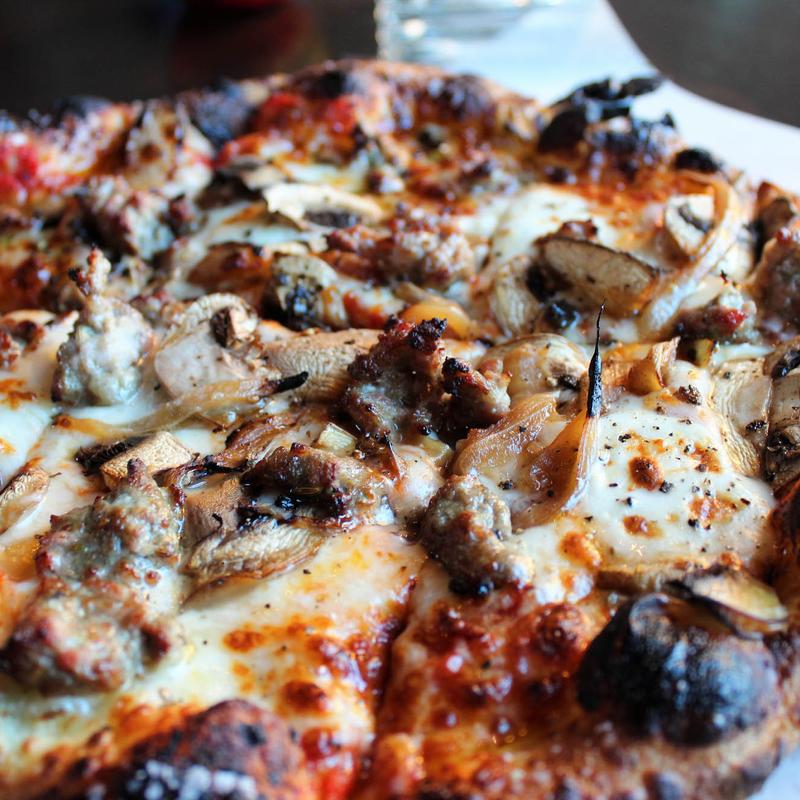 Italian sausage, caramelized onions, mushrooms, fresh mozzarella, tomato sauce - can be GF photo