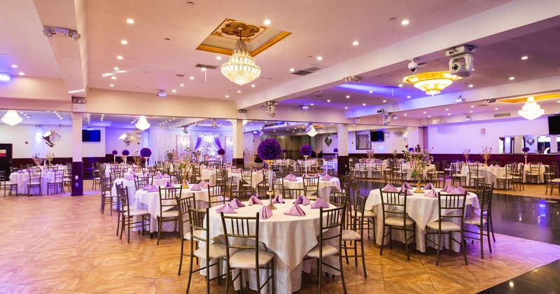 Banquet hall with tables set for dining