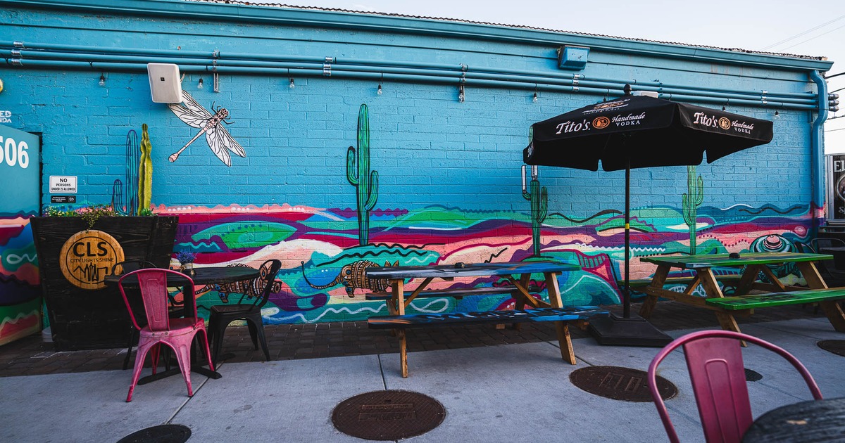 Exterior,  eating area, colorful wall mural